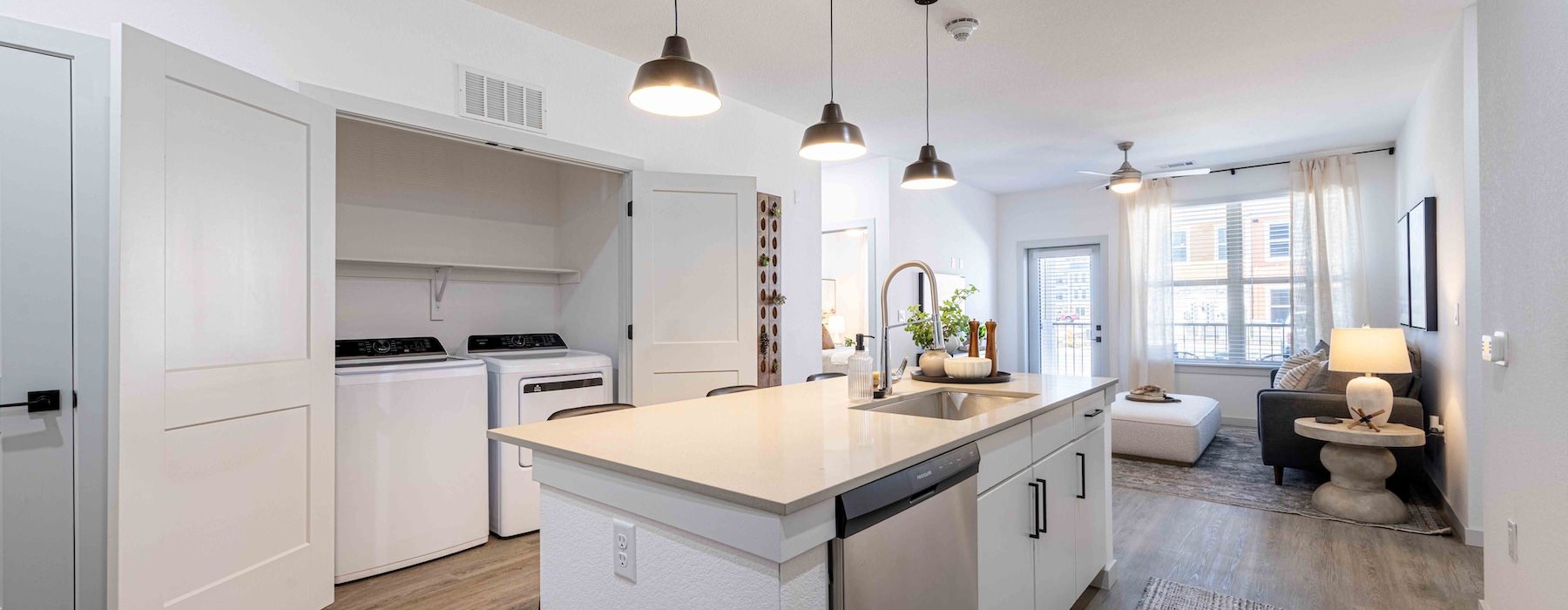 a kitchen with white cabinets