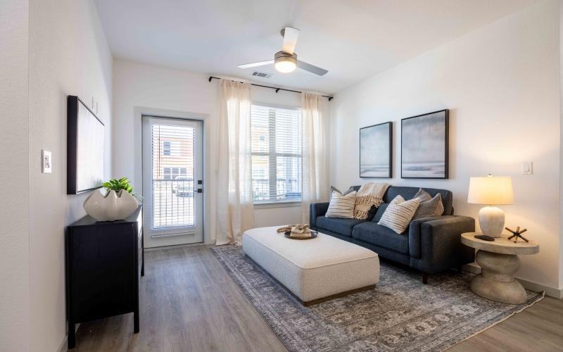 a living room with a couch and a table
