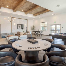 a large room with a table and chairs