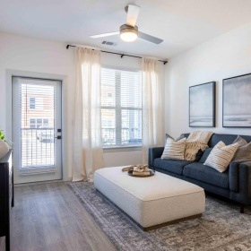 a living room with a couch and a table